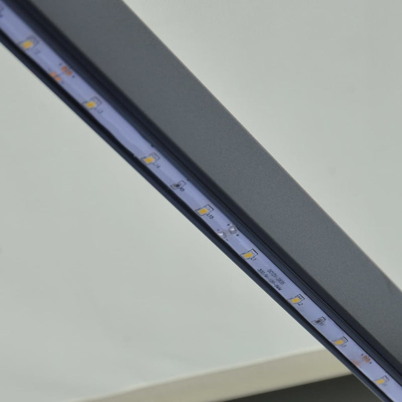 Uttrekkbar markise med vindsensor og LED 600x300 cm kremhvit